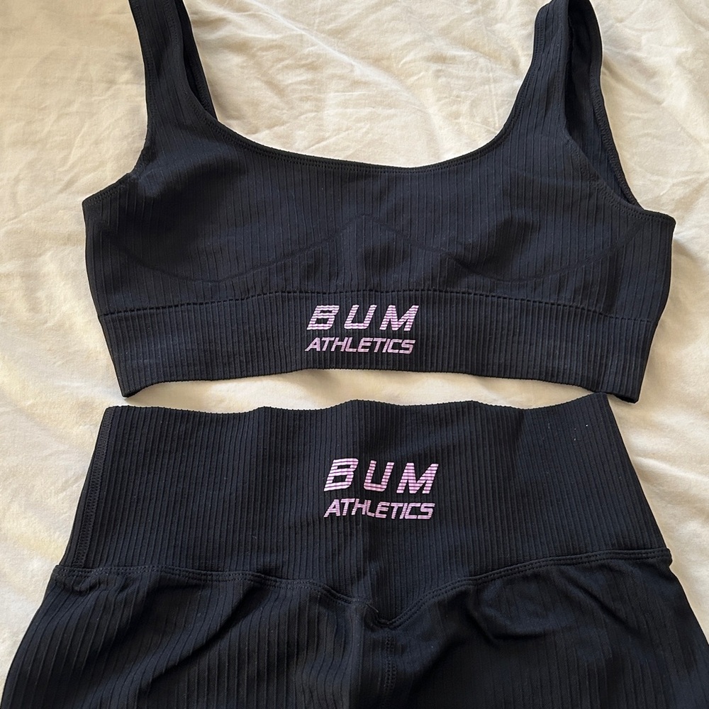 Black BUM Athletics Sports Bra and full length stretch leggings sets.